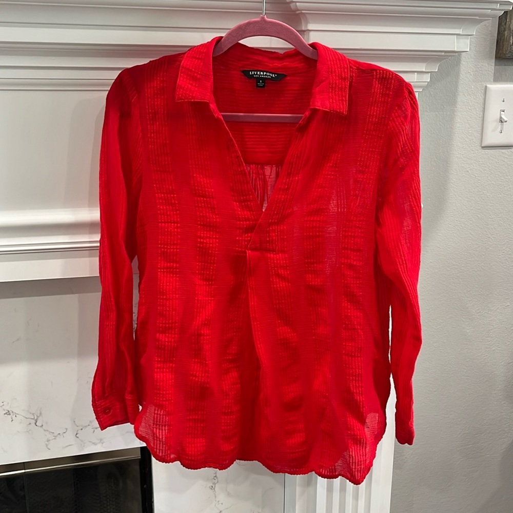 EUC red cotton blouse.